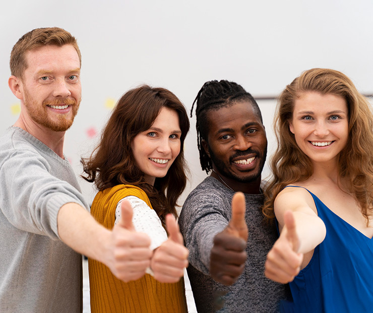 Colleagues with thumbs up